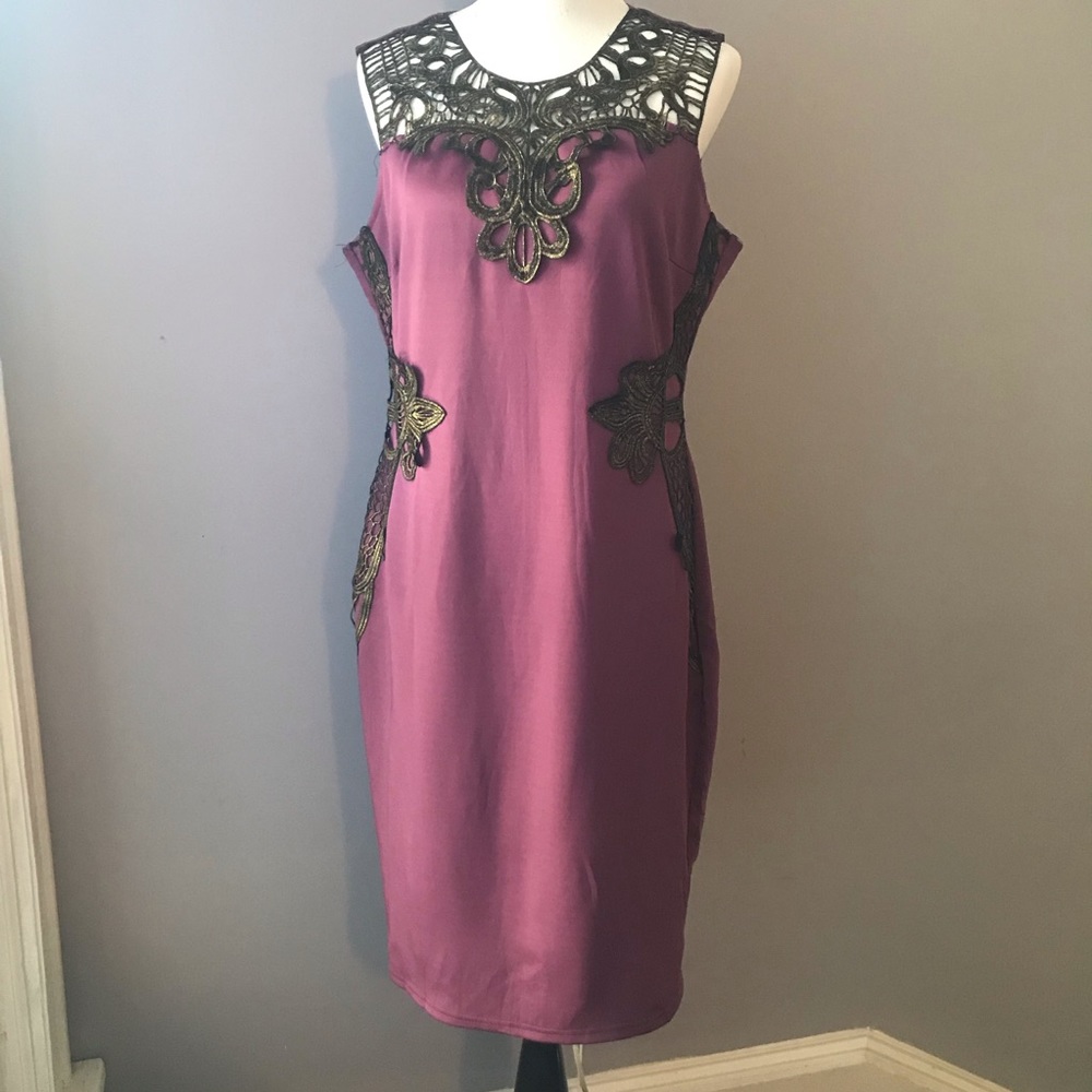 Purple dress with antique bronze appliqués